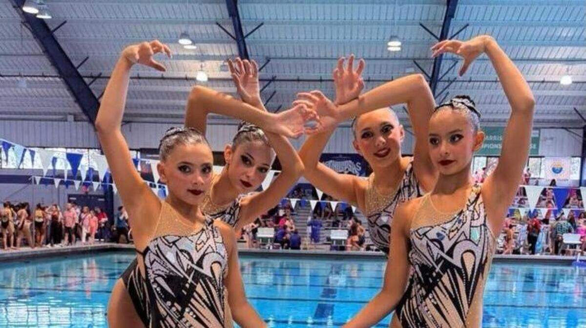 From left to right: Samantha López, Sabrina Álvarez, Elizabeth Rodríguez and Isabella Rodríguez, members of the Hialeah Stormettes synchronized swimming team, pose in front of an indoor competition pool in matching performance swimsuits. From left to right: Samantha López, Sabrina Álvarez, Elizabeth Rodríguez and Isabella Rodríguez, members of the Hialeah Stormettes synchronized swimming team, pose in front of an indoor competition pool in matching performance swimsuits.